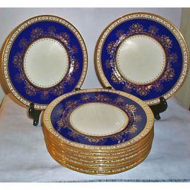 12 Minton Tiffany cobalt and raised gold dinner or service plates