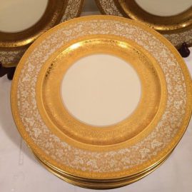 Close up of one of the set of the gilded Heinrich and company service plates.