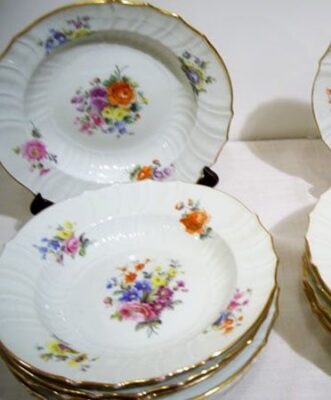 Set of Berlin wide rim soups each painted with different bouquets