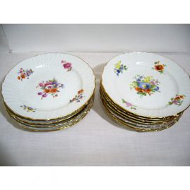 Set of 12 Berlin KPM dinner plates, each painted with different flower bouquets