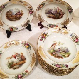 Set of twelve Paris Porcelain bird plates, each painted differently