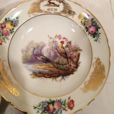 Close up of one of the Paris Porcelain bird bowls, one of the set of twelve, each painted differently