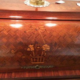 Close up of marquetry inlaid antique French cylinder desk