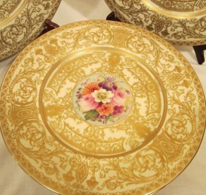 Close up of one of the Royal Worcester flowered dinner plates, each painted differentl