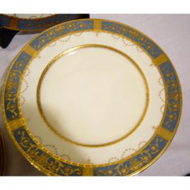 Close-up of one of the twelve Minton gilded dinner plates