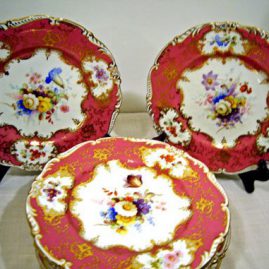 Set of 8 Coalpor luncheon plates each painted with different flower bouquets