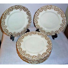 10 Royal Doulton dinner or service plates, cream with raised gilding