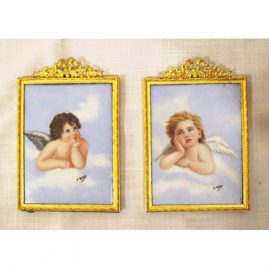 Pair of cherub porcelain painted plaques artist signed