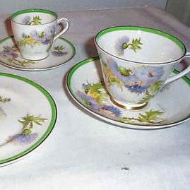 Royal Doulton thistle set signed Percy Curnock