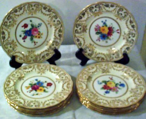 Set of twelve George Jones made for Tiffany dessert plates each painted differently