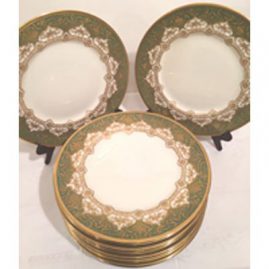 Set of twelve profusely gilded green Royal Doulton dinner plates