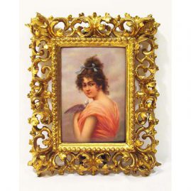 Porcelain plaque of lady with bird signed Dittrich in Venetian frame