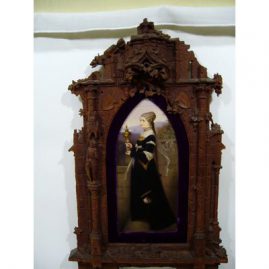Large KPM plaque in carved Black Forest frame, raised carvings of knights and castles