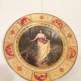 Royal Vienna plate of lady with long dress in the woodlands