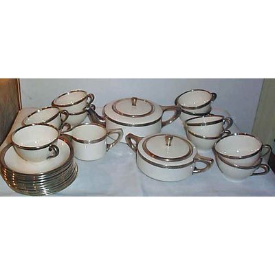 Lenox sterling silver rimmed tea set, teapot, sugar, creamer & 11 cups and saucers