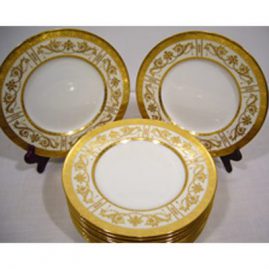 Set of 12 Minton luncheon plates with intricate raised gilding decoratio