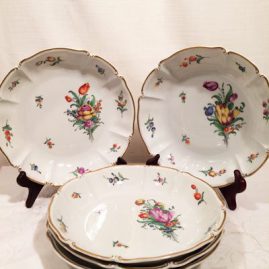 Set of 14 Nymphenburg bowls each painted with different flower bouquets