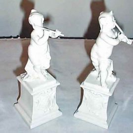 Pair of Nymphenburg cherub musicians, impressed shield marks, 6 1/2 inches tall, only one left-$600.00