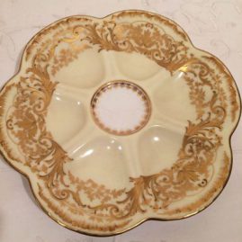 Set of ten rare limoges oyster plates with raised gilding