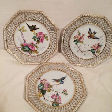 Set of 12 Pirkenhammer reticulated bird plates, each painted differently