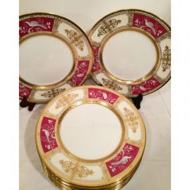 Set of twelve Minton pate sur pate dinner plates made exclusively for Tiffany and Company signed W. Key