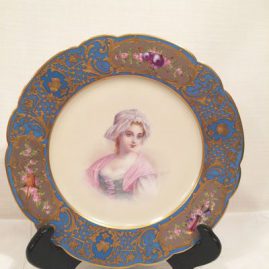 Sevres portrait plate of lovely lady with raised gilding and silver medallions