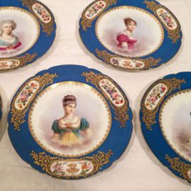 Set of twelve Sevres portrait plates, each painted with different famous French women of nobility