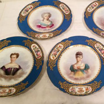Set of twelve Sevres celeste blue portrait plates