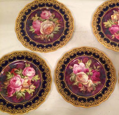 Set of twelve Cauldon hand painted rose plates