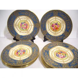 Set of 12 Royal Worcester plates, 11 artist signed William Hale, the 12th signed E. Townsend, all painted with different bouquets of flowers