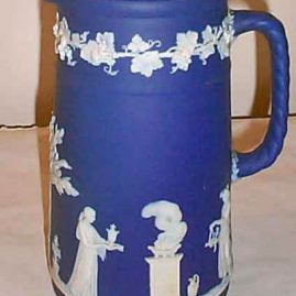 Tall Wedgwood dark blue jasperware pitcher, 1890-1920