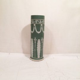 Tall green Wedgwood vase with lilies of the valley and rams heads