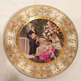 Royal Vienna plate of three ladies in a garden with one lady playing the harp