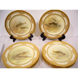 11 Royal Doulton fish plates made for Tiffany with raised gilding, each painted