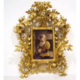 Porcelain plaque of lovely lady with book in venetian frame