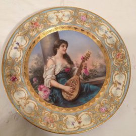 Royal Vienna plate of beautiful lady playing a mandolin,artist signed Wagner