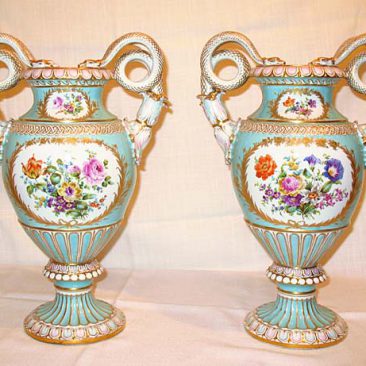 Back of pair of Meissen vases with Boucher scenes on front and flowers on the