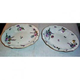Antique Meissen bowls with flower bouquets, each painted differently