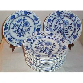 Nine Meissen blue onion dinners