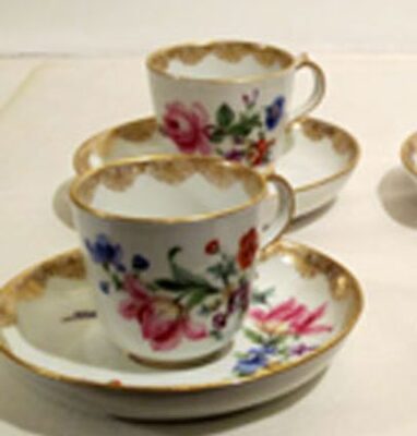Meissen flowered demitasse cups and saucers
