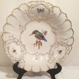 Meissen charger painted with birds and bugs