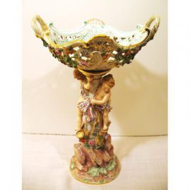 Meissen centerpiece of boy and girl