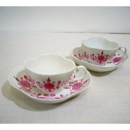 Two rare Meissen quatrefoil shape cups and saucers