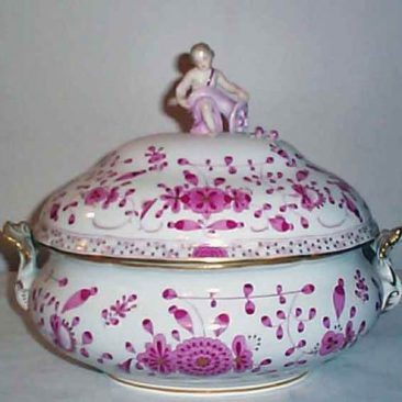 Meissen figural tureen with putti on top