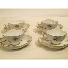 Four rare Meissen quadrefoil shaped streublumen demitasse cups and saucers