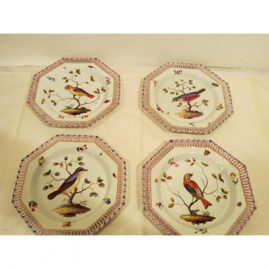 Four Meissen reticulated octagonal plates with bird and bug decoration