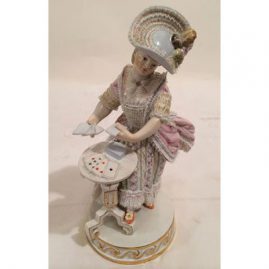 Meissen figurine of lovely lady playing cards