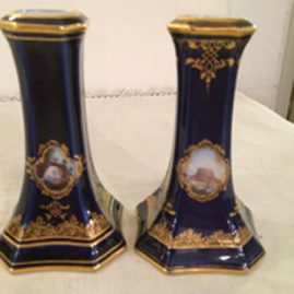 Pair of Meissen cobalt vases with topographical paintings, each painted differently