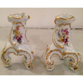 Pair of Meissen candlesticks or vases on three feet