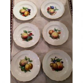 Set of twelve Meissen fruit plates finely painted, each painted differently with different paintings of fruits.